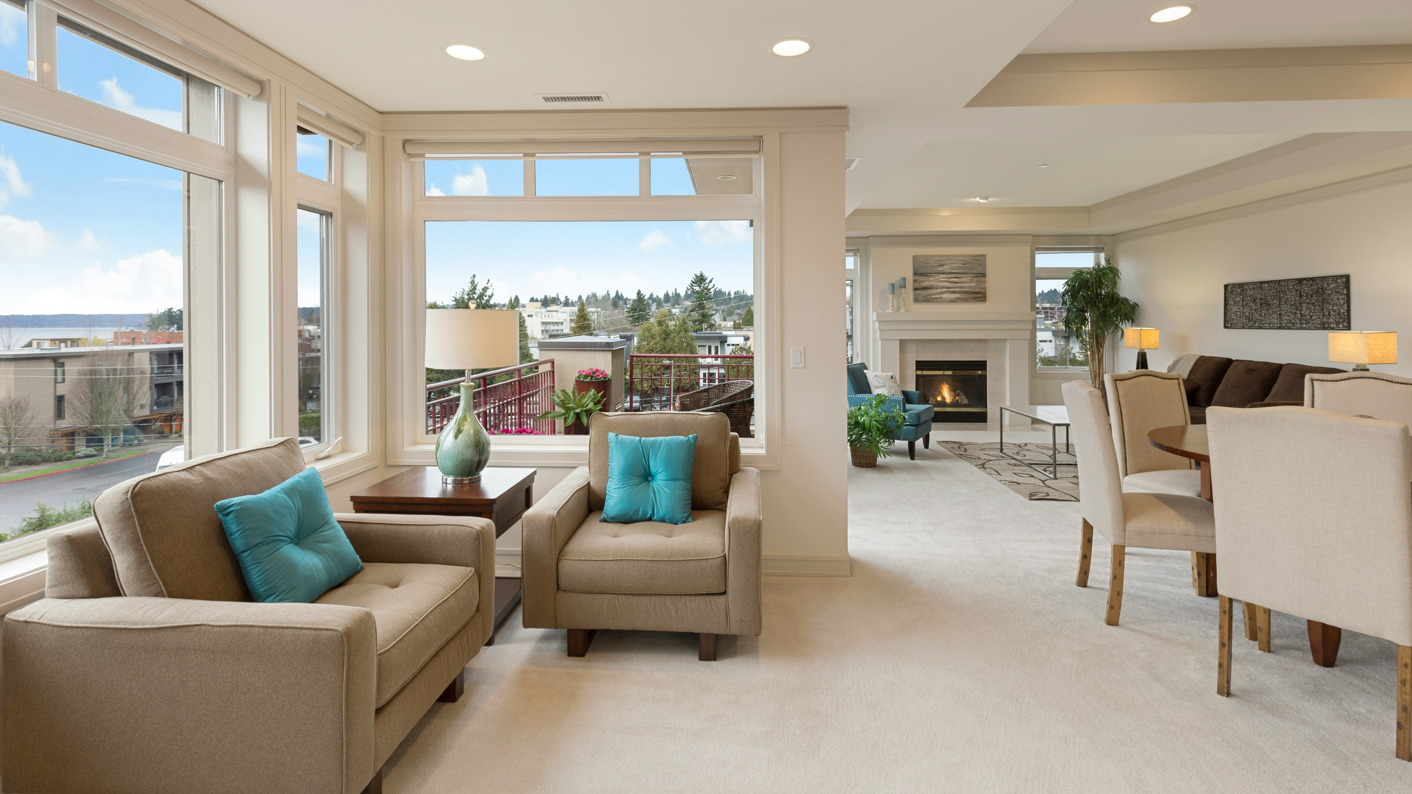 A bright living room with a view over the neighbourhood